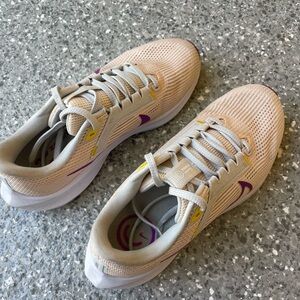 Nike Cream and Purple Athletic Shoes with Cushioned Midsole